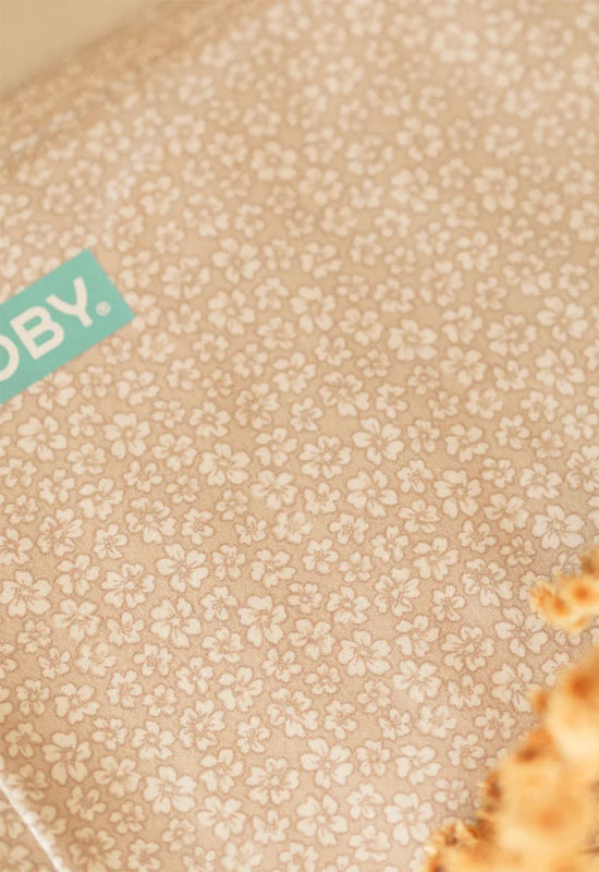 Muster mit Logo Classis Tragetuch Moby Coastal Blooms